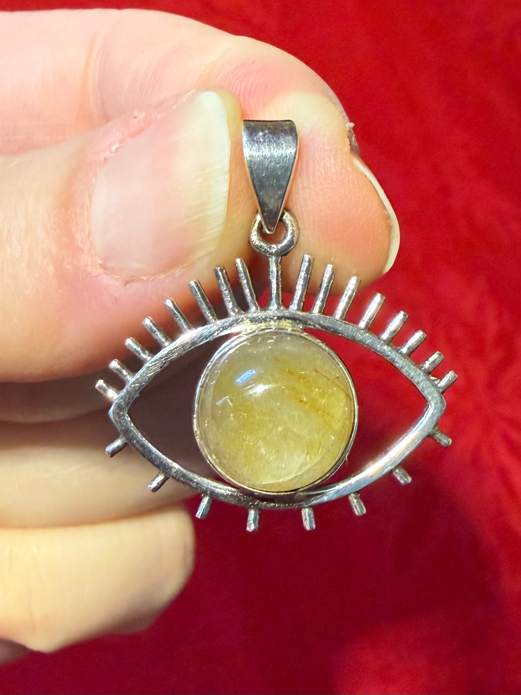 1-1/8” Rutilated Quartz Sterling Silver Eye Pendant