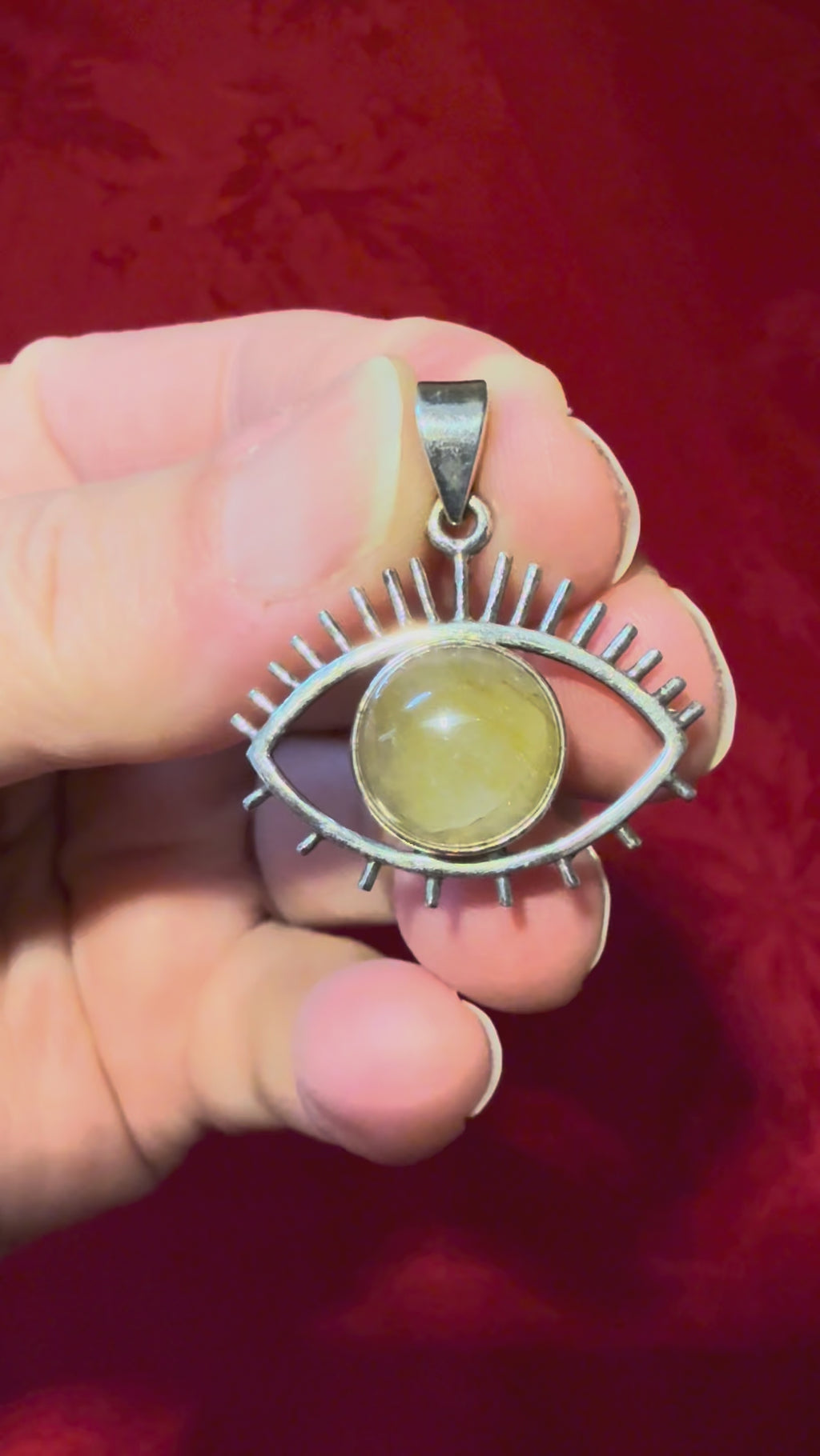 1-1/8” Rutilated Quartz Sterling Silver Eye Pendant