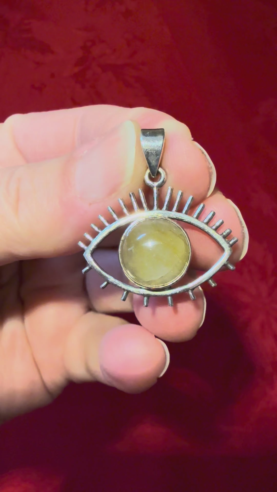 1-1/8” Rutilated Quartz Sterling Silver Eye Pendant